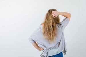 What Causes a Back Part in Your Hair